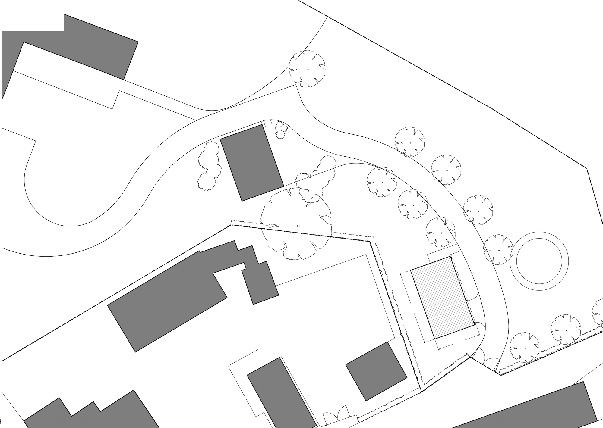 Site plan showing the proposed annex beside the drive, among the surrounding buildings and trees