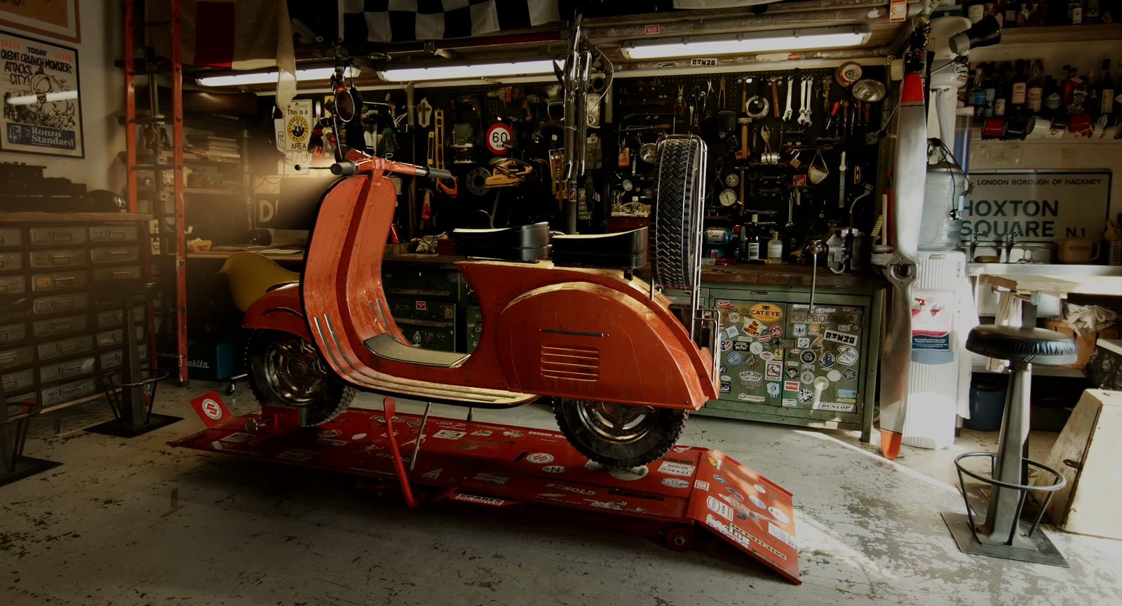 Frame of the composited Vespa in the garage
